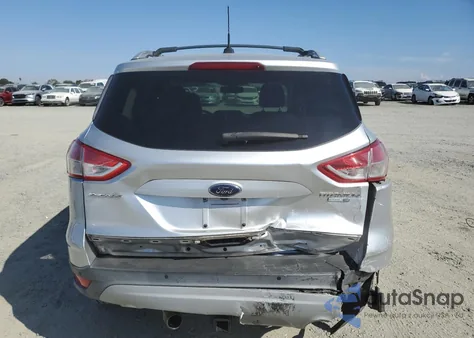 2013 Ford Escape Titanium z USA, uszkodzony, nr VIN 1FMCU9J97DUD10627